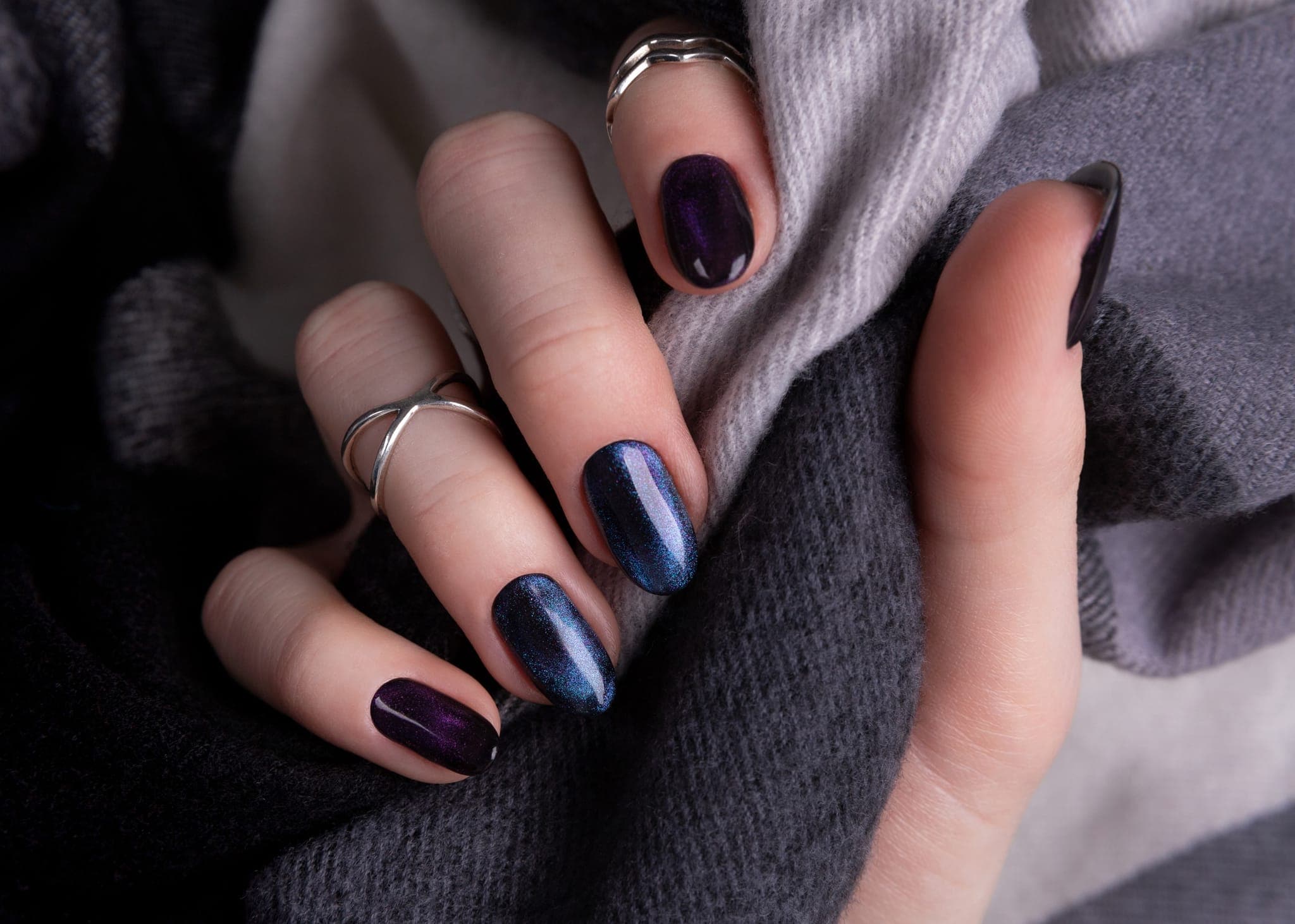 Dark glitter cat-eye manicure in plum and midnight blue by Mani Magic Studio, Richmond Hill